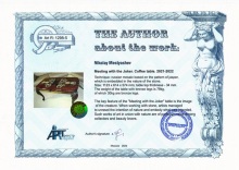 Meeting with the Joker Cofee table. The Author about the work